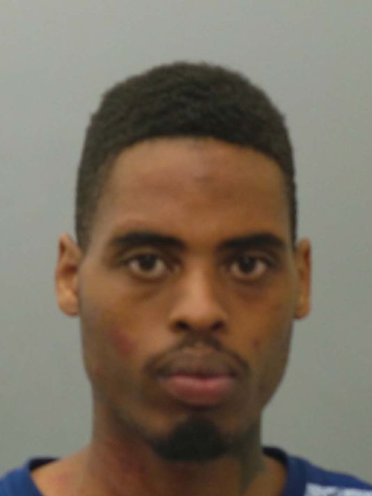 Protester Charged with Shooting Officers in Ferguson
