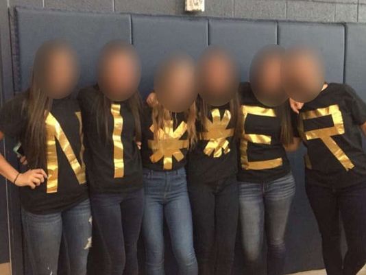 Students in Hot Water for Pic with T-shirts Spelling Racial Slur