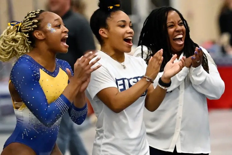 Fisk University gymnast Naimah Muhammad, left, Kiana Session and head coach Corrinne Tarver