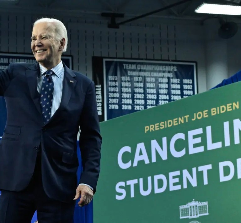 US President Joe Biden gestures after speaking about student loan debt relief at Madison Area Technical College in Madison, Wisconsin, April 8, 2024.