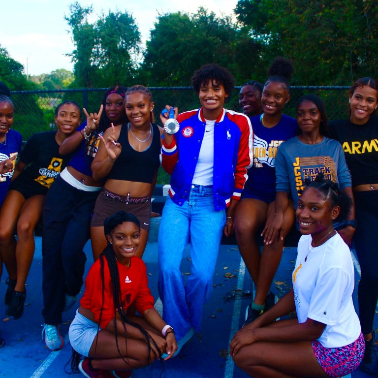 Anna Cockrell with the JCSU track and field team