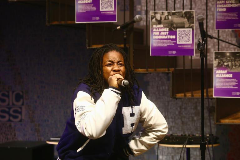 Blavatnik Music Business Center fellow Aisha June sings mid-performance.