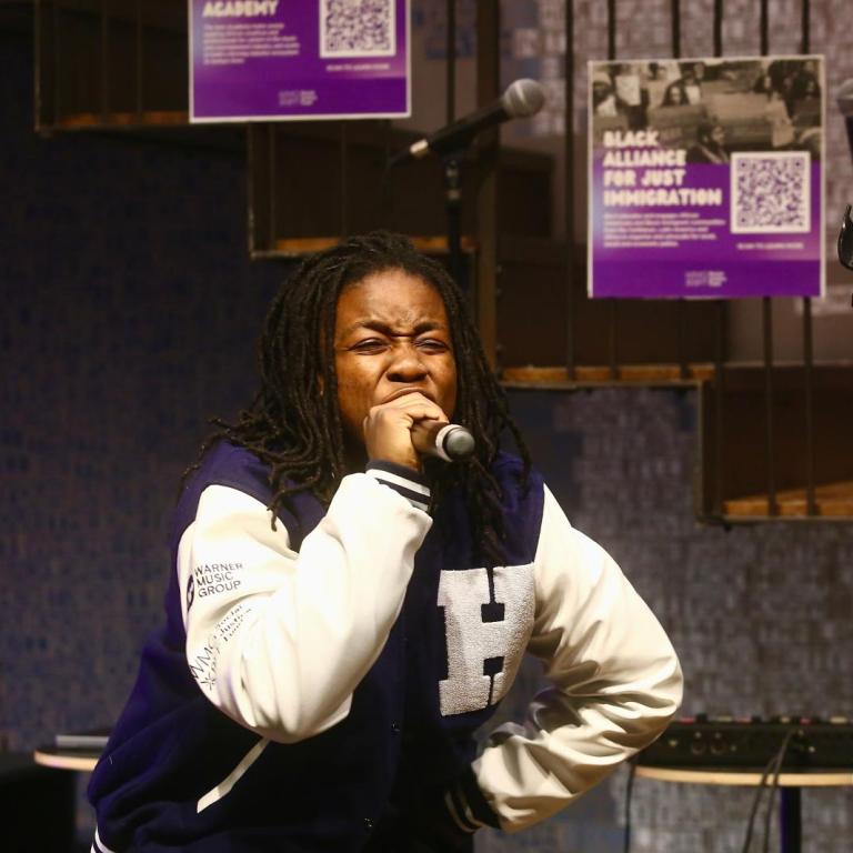 Blavatnik Music Business Center fellow Aisha June sings mid-performance.