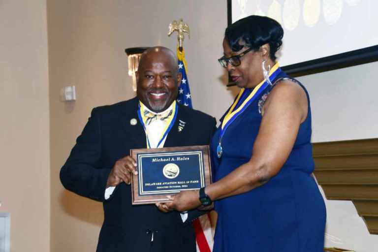 Lt. Col. Michael Hales receives his induction into the Delaware Aviation Hall of Fame from LeSans Alexander, Chair of that organization’s Board of Trustees. Lt. Col. Hales was recognized from his 25-year career as a U.S. Army aviator and for his seven years as the Director of the DSU Aviation Program.