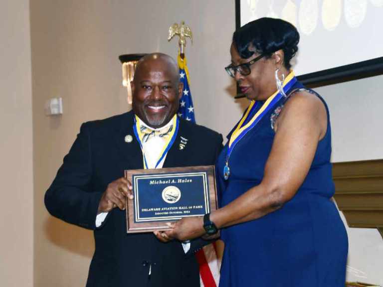 Lt. Col. Michael Hales receives his induction into the Delaware Aviation Hall of Fame from LeSans Alexander, Chair of that organization’s Board of Trustees. Lt. Col. Hales was recognized from his 25-year career as a U.S. Army aviator and for his seven years as the Director of the DSU Aviation Program.