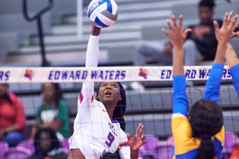 EWU women's volleyball player hits the ball in a game