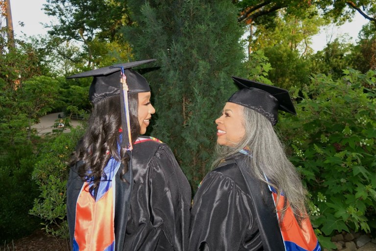 Alexis and Cerita in their cap and gowns