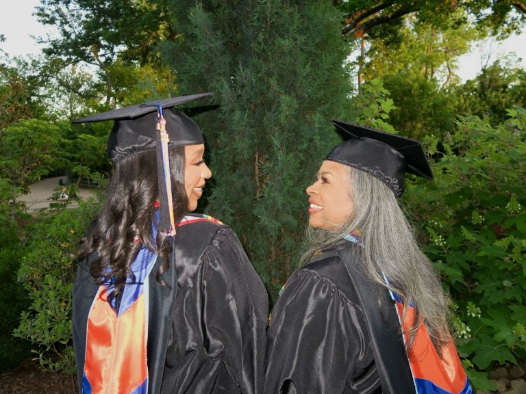 Alexis and Cerita in their cap and gowns