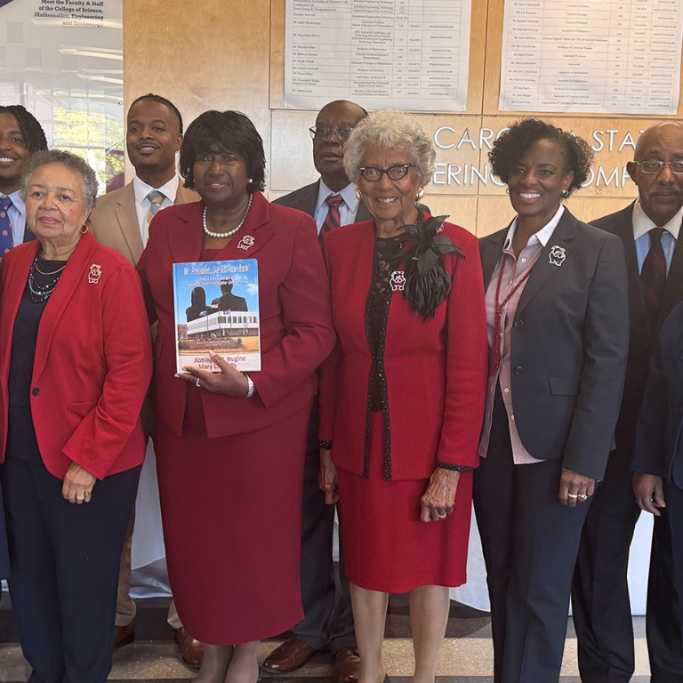 Front row from left: Dr. Monedia K. Elzey, Mary L. Smalls, Abbigail Hamilton Hugine, Frances Finney, Agatha Conyers, Carla Carpenter. Back row from left: Nick Nance, Jackston Nance, Dr. Andrew Hugine and Dr. Carl A. Carpenter.