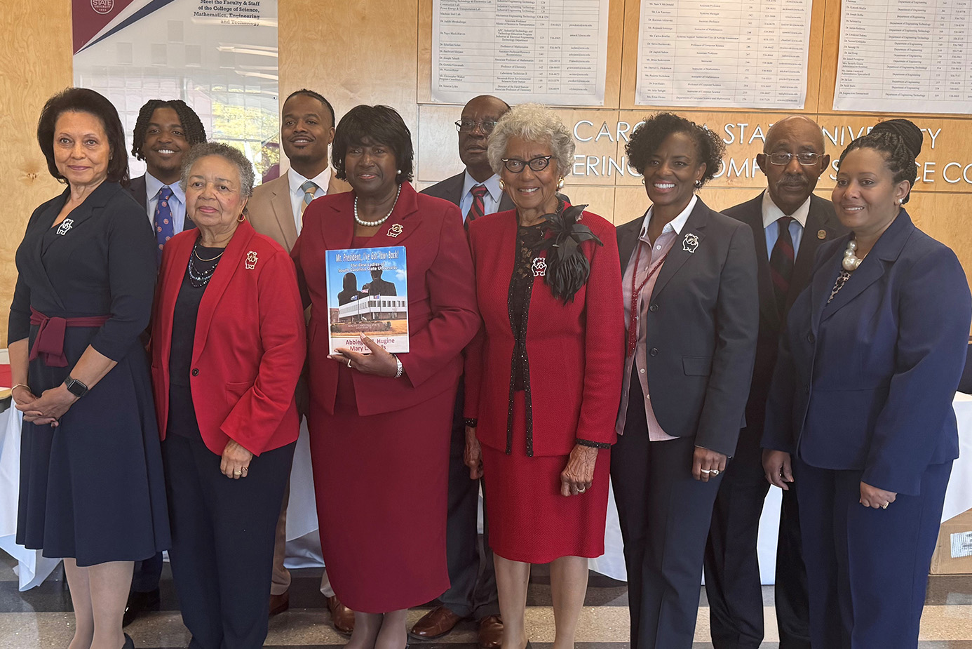 Front row from left: Dr. Monedia K. Elzey, Mary L. Smalls, Abbigail Hamilton Hugine, Frances Finney, Agatha Conyers, Carla Carpenter. Back row from left: Nick Nance, Jackston Nance, Dr. Andrew Hugine and Dr. Carl A. Carpenter.