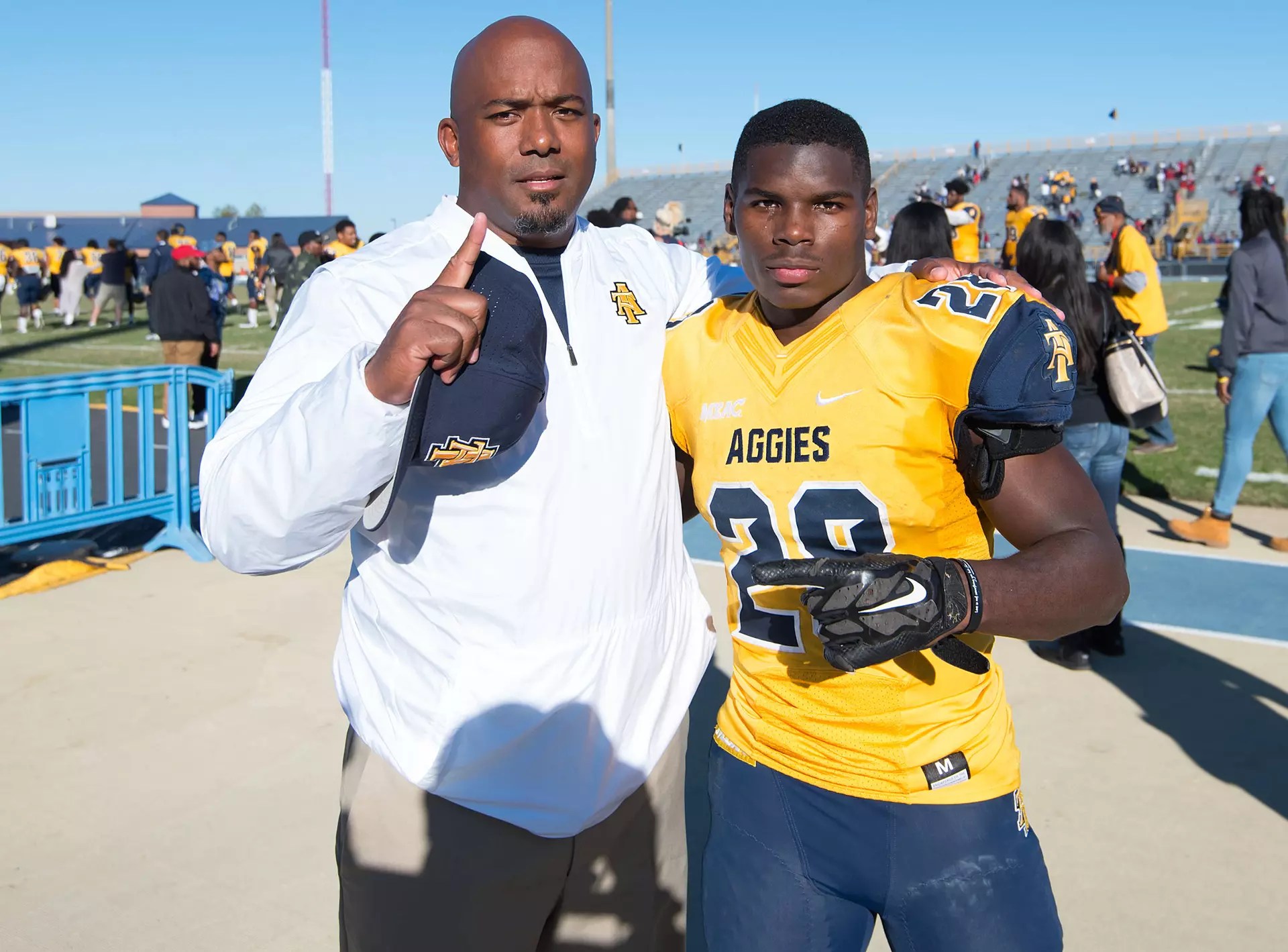 Gibbs pictured with Tarik Cohen (right), who became an NFL All-Pro.