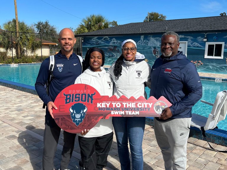 Howard Swim members with key to the city