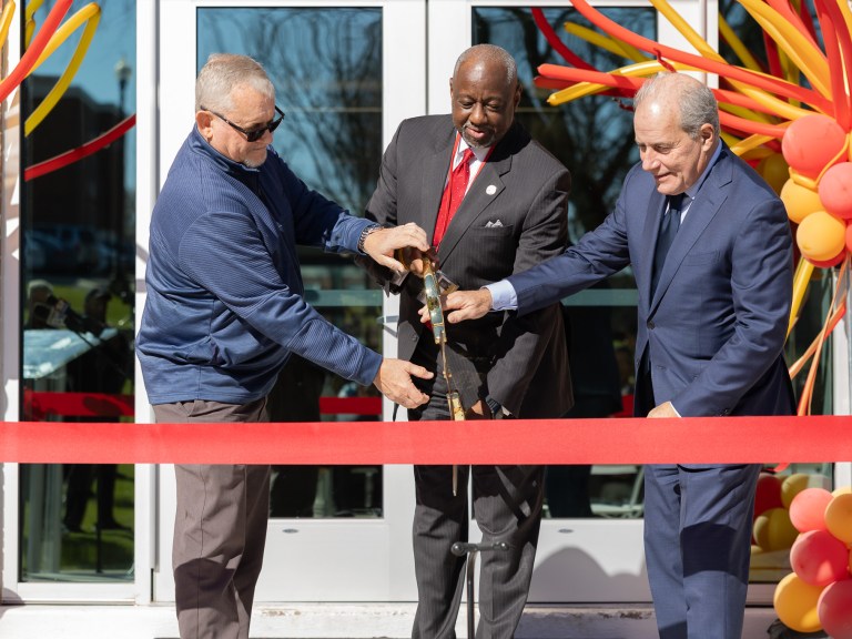 Ribbon cutting at the reopening ceremony of Olivia Davidson Hall.